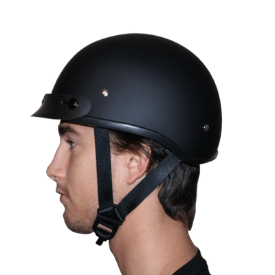 A man wearing a black Daytona D.O.T Skull Cap - w/Wild at Heart Helmet with a side buckle strap.