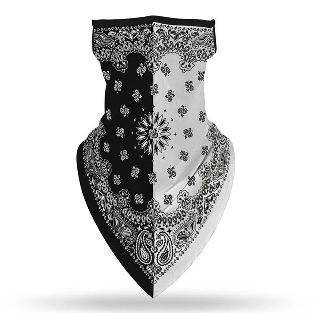 The ALR™ Outdoor Balaclava Motorcycle Face Mask, in a half black, half white design with paisley and floral patterns, is folded into a triangle shape for a stylish addition to your motorcycle accessories.