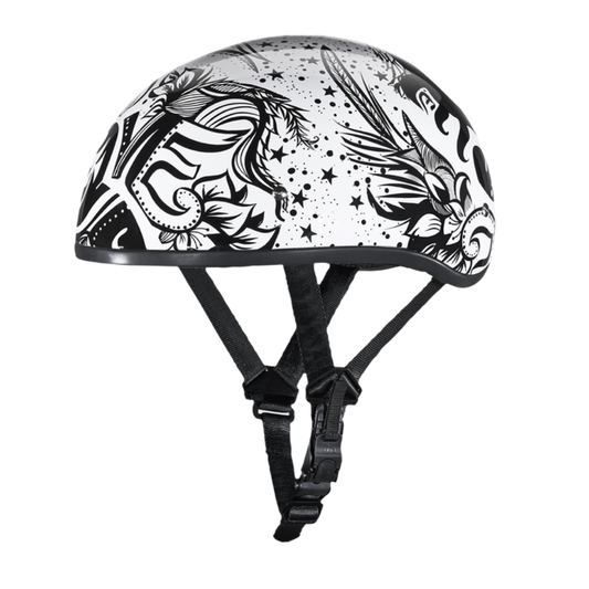 A black and white Daytona D.O.T Skull Cap - w/Lovesee Helmet with intricate floral and abstract designs, featuring a slim line design, adjustable black straps, and a plastic buckle.