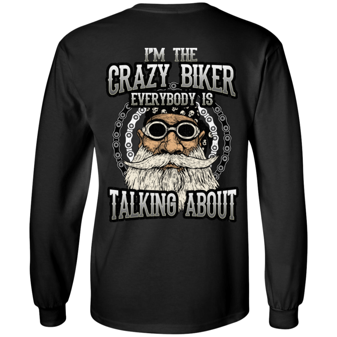 The "I'm The Crazy Biker Long Sleeves" is a black long-sleeve shirt showcasing an illustrated bearded biker with goggles and the text "I'm the crazy biker everybody is talking about." Made from 100% cotton and available in unisex sizing, this digital print design offers both comfort and style.
