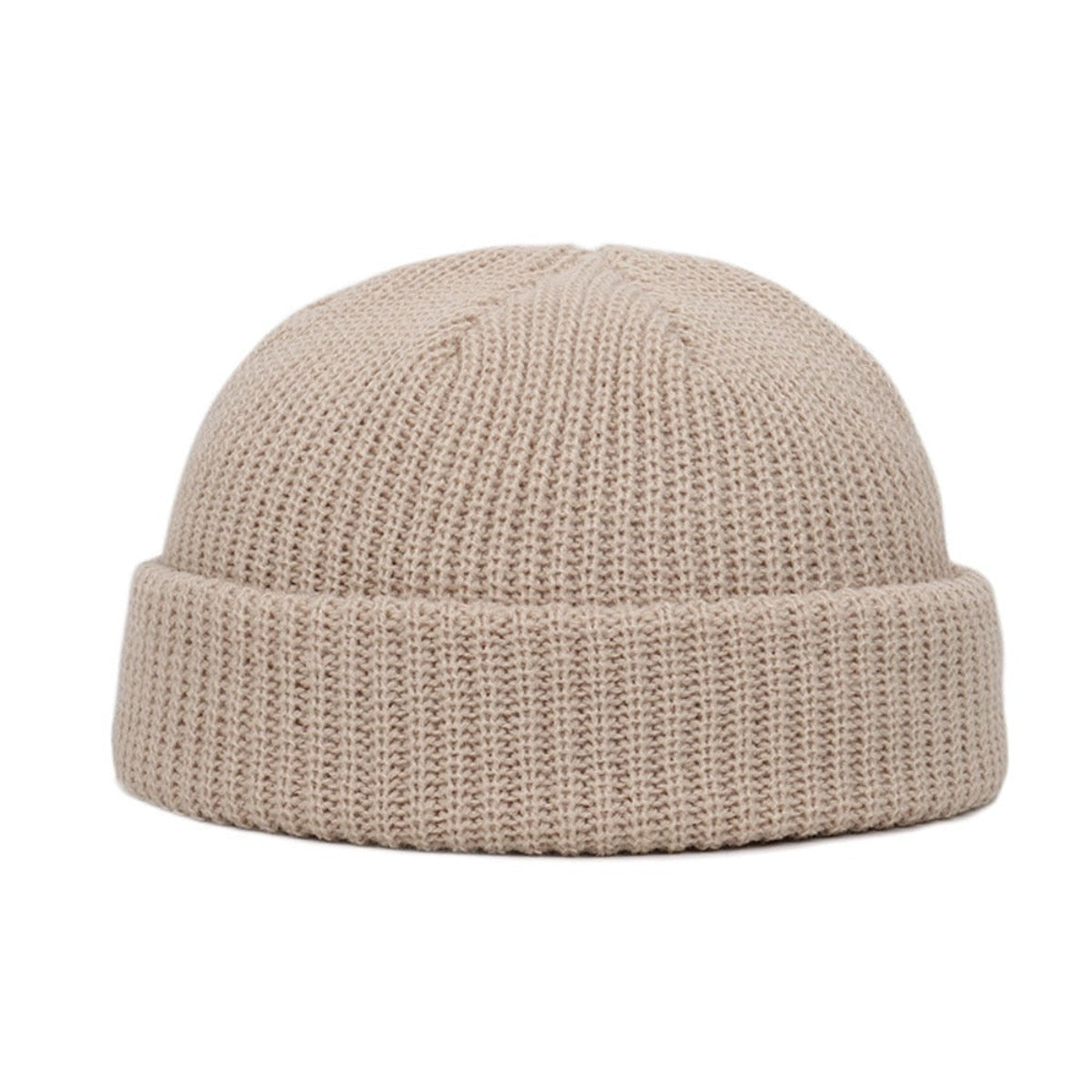 A Wool Knitted Skull Cap Beanie in beige, made of a knit fabric, on a white background.
