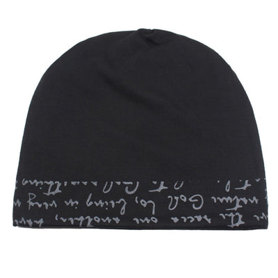 A Fashionable Printed Beanie Hat made of cotton with writing on it.
