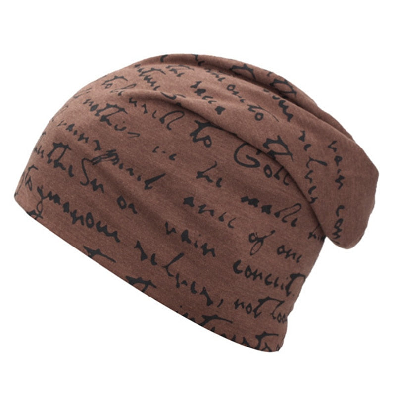 A Fashionable Printed Beanie Hat with writing on it, perfect for a casual look.