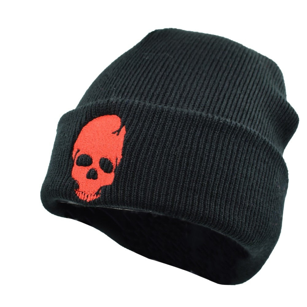 A black Winter Beanie w/ Embroidered Skull Design.