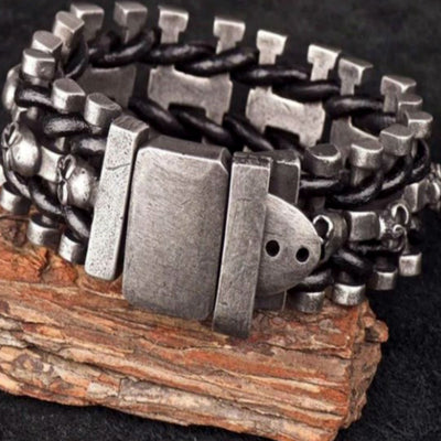 A Skeleton Chain Buckle Bracelet featuring a skull and crossbones, perfect for freedom riders or those seeking biker styling items. The Skeleton Chain Buckle Bracelet is ideal for freedom riders or those looking for biker styling items.