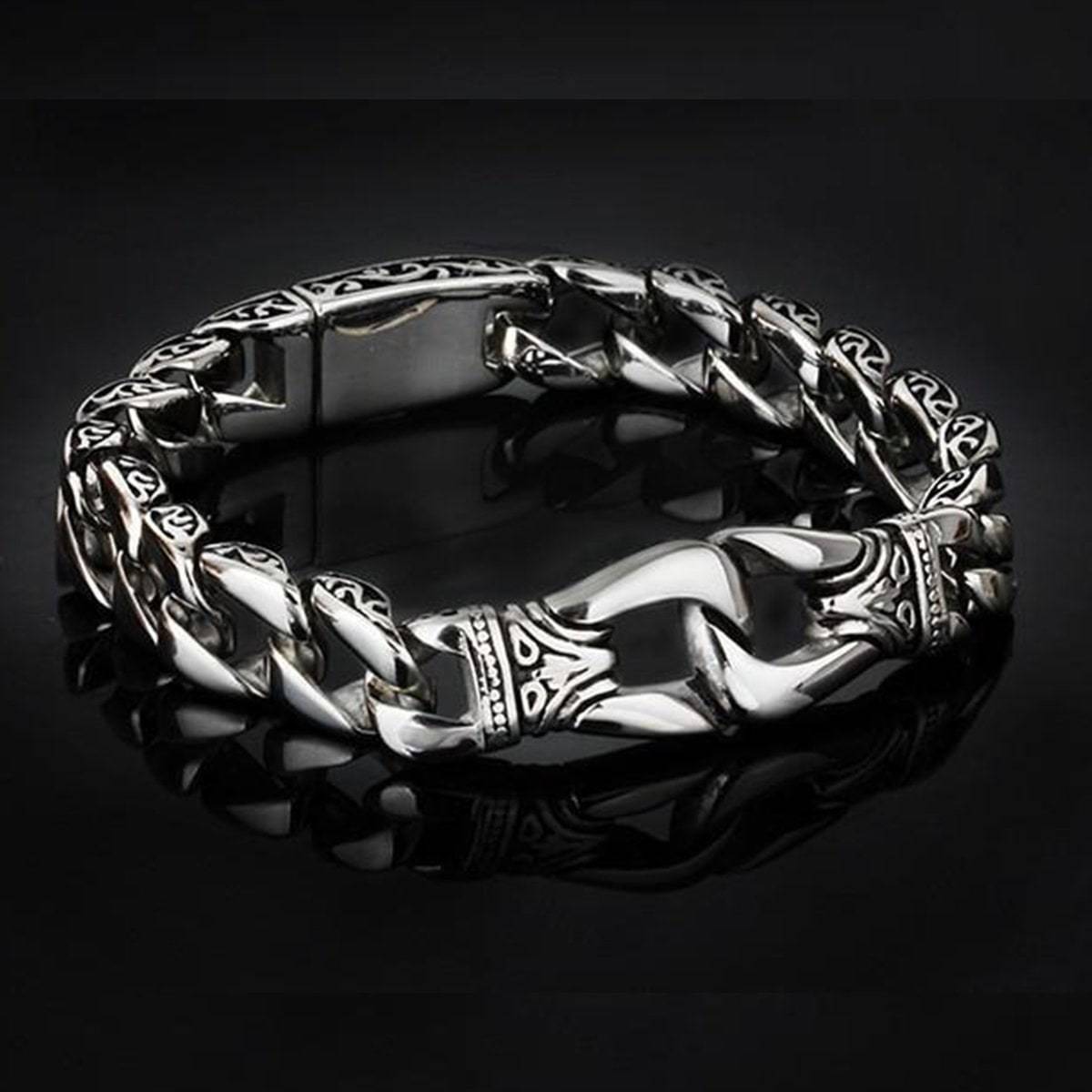 A Stainless Steel Vintage Charm Bracelet for Bikers with intricately designed links and a clasp featuring ornate patterns is displayed against a black background, embodying the allure of modern medieval fantasy jewelry.