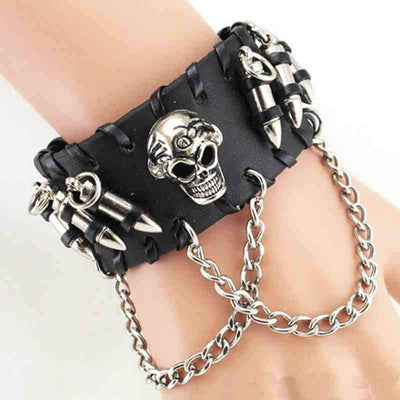 A gothic-style Leather Skull Bracelet with skull and chain details worn on a wrist.