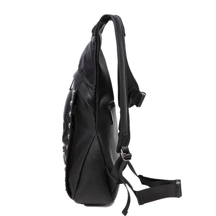 A 3D Skull Backpack Hoodie with straps and studs.