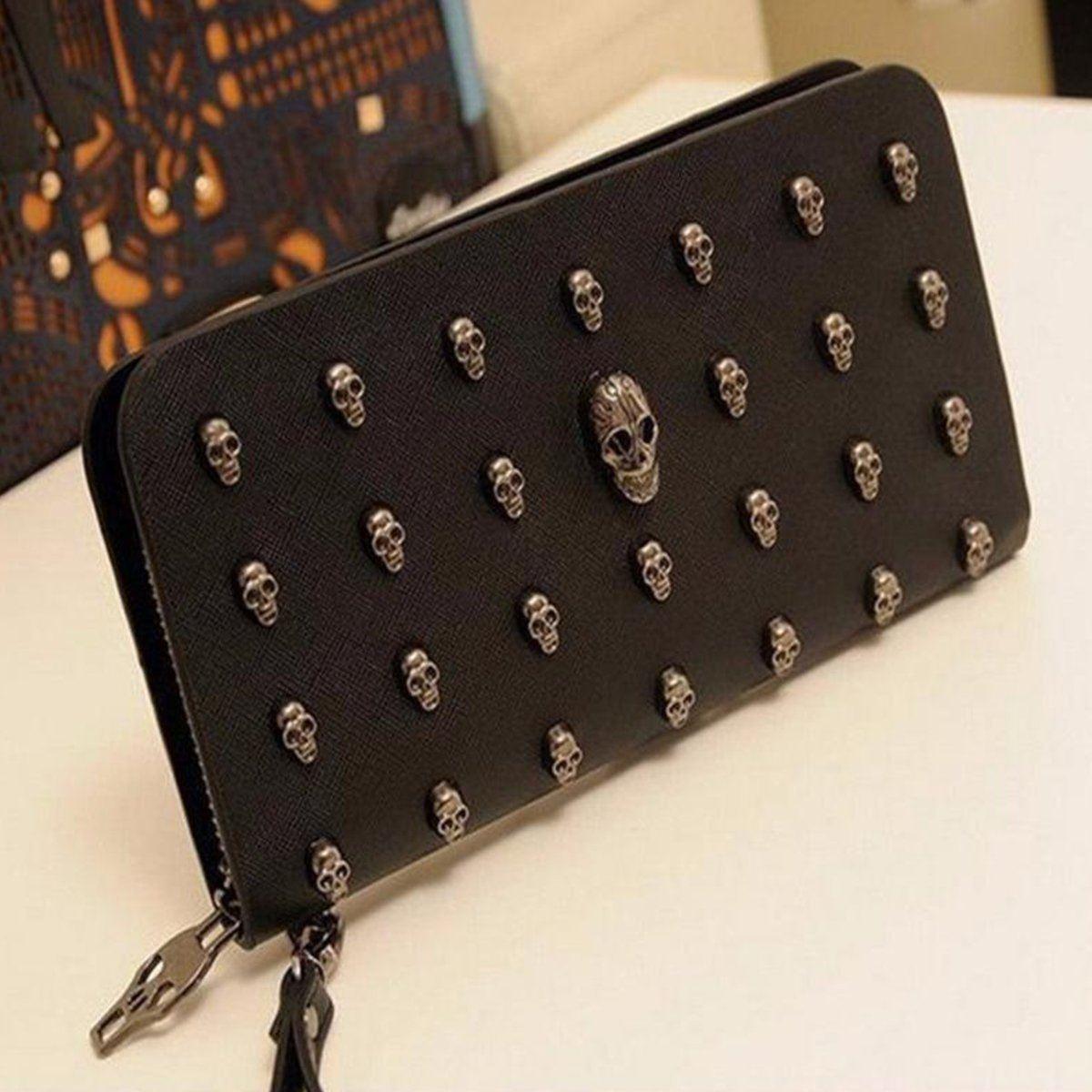 A Vintage Skull Wallet with skulls and tassels.