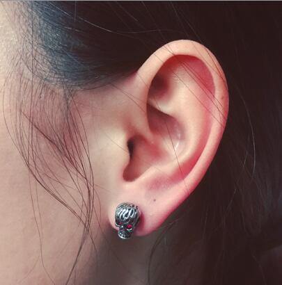 Red Eye Skull Stud Earrings for Men & Women, Stainless Steel/Crystal, 0.4 x 0.3 in - American Legend Rider