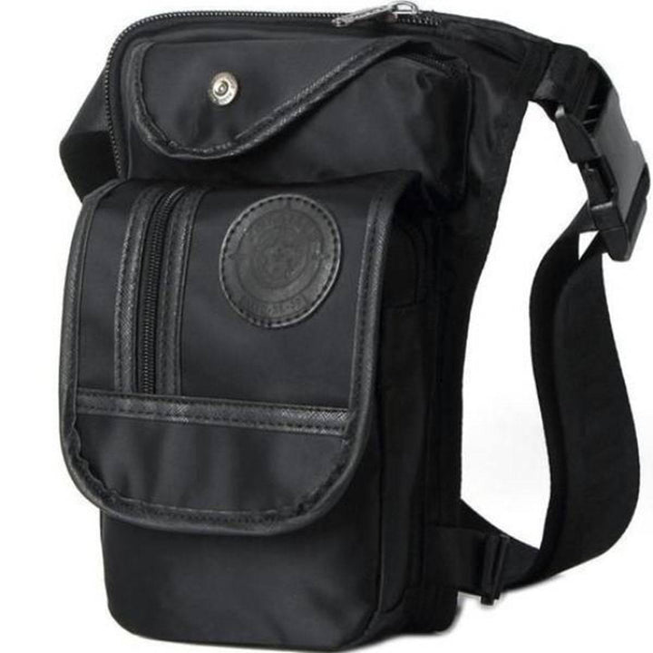 A durable and lightweight canvas image of a black Rider's Rebel Essentials Bundle: Leg Bag, Gloves, and Sunglasses, perfect for the rider's rebel essentials bundle.
