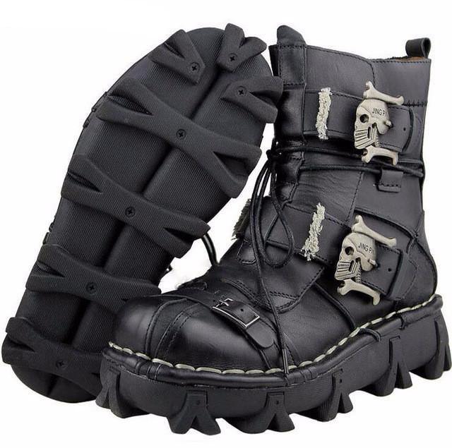 A pair of Handmade Leather Skull Boots with buckles.