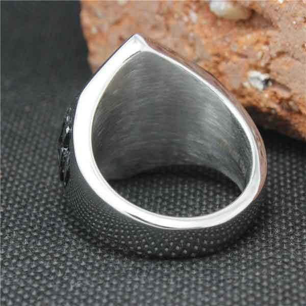 A 1%ER Man Ring with a black stone on it.