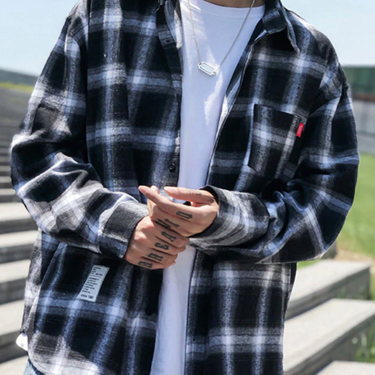An American Legend Ride enthusiast donned a Men's Classic Plaid Flannel Shirt, Black/White.