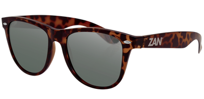 A pair of oversized Daniel Smart Minty Tortoise Frame sunglasses with smoke lenses, featuring the brand "zan" on the temple, isolated on a transparent background.