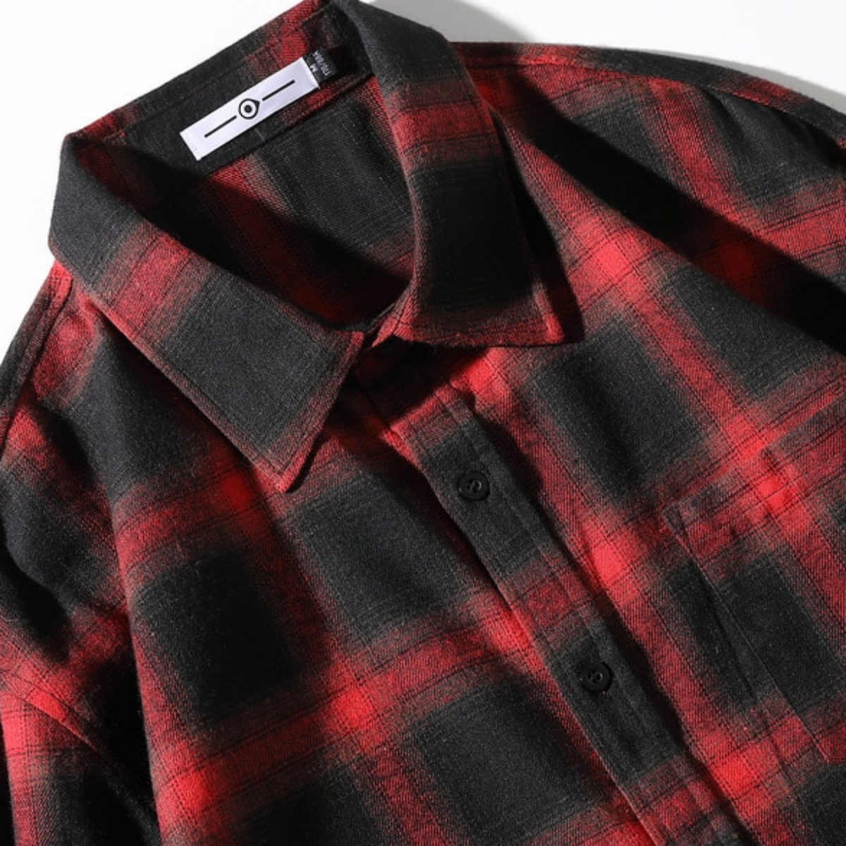 Men's Classic Plaid Flannel Shirt in red and black with a collar, shown lying flat.
