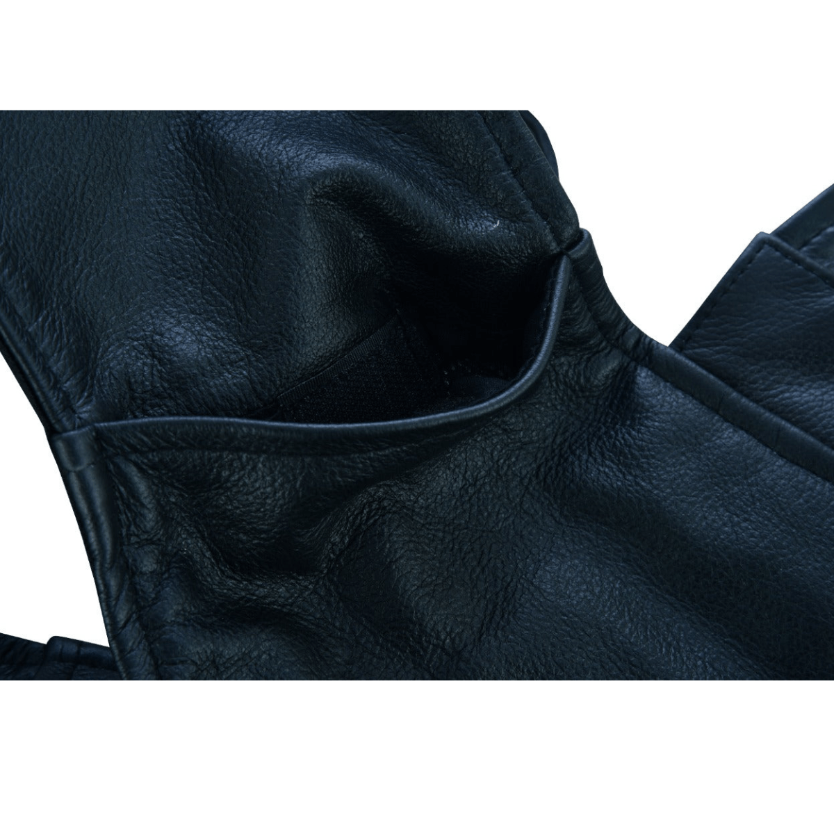 Close-up image of Vance Zip-Out Insulation Pant Style Motorcycle Leather Chaps in black, showcasing the texture and stitching details, complemented by a sleek mesh lining.
