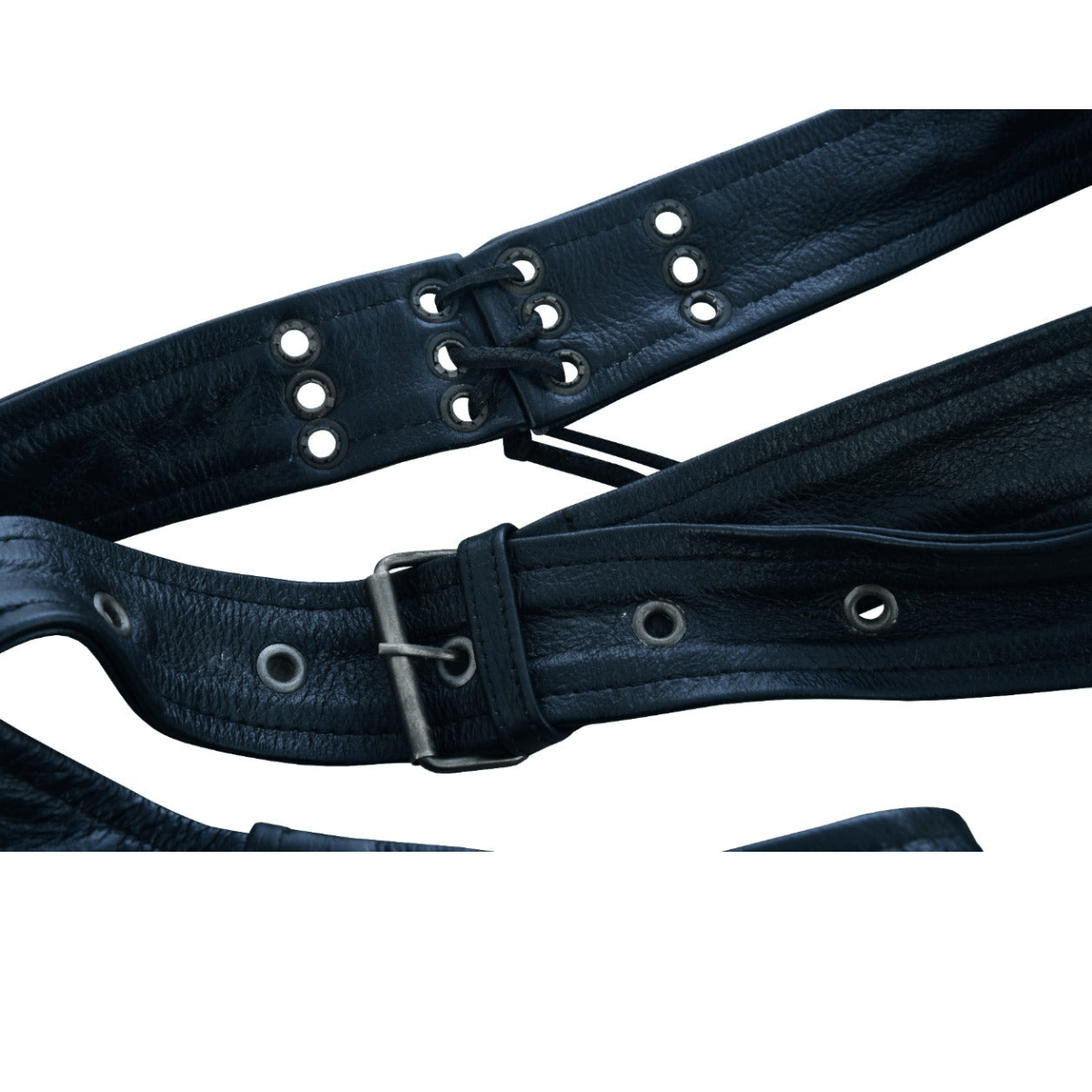 Close-up of Vance Zip-Out Insulation Pant Style Motorcycle Leather Chaps showcasing black leather belts with metal eyelets, a buckle, and interlacing straps, reminiscent of their sturdy construction.