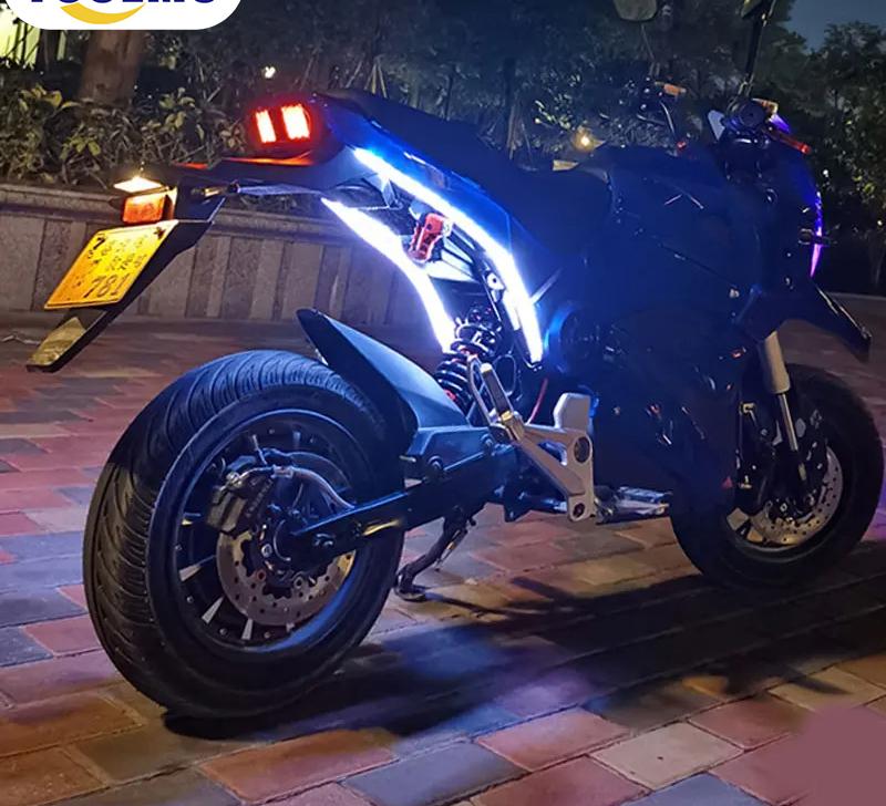 motorcycle LED strip lights glowing blue on a bike