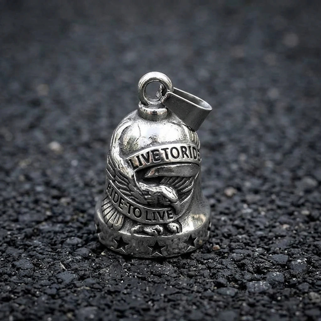 Motorcycle guardian bell hanging from bike frame with keyring mount