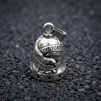 Motorcycle guardian bell hanging from bike frame with keyring mount
