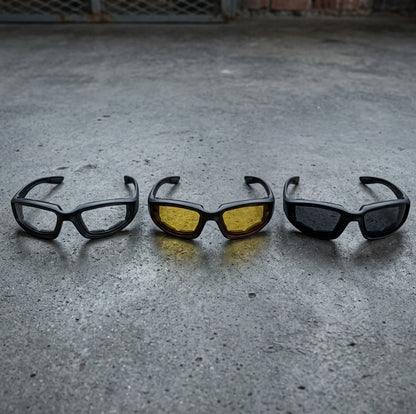Polarized motorcycle riding glasses with padded black frames in clear, yellow and smoke lenses