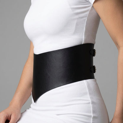 Side profile showing the pointed V front hem of the corset waist belt