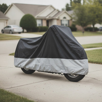 Black and gray waterproof motorcycle cover over a cruiser