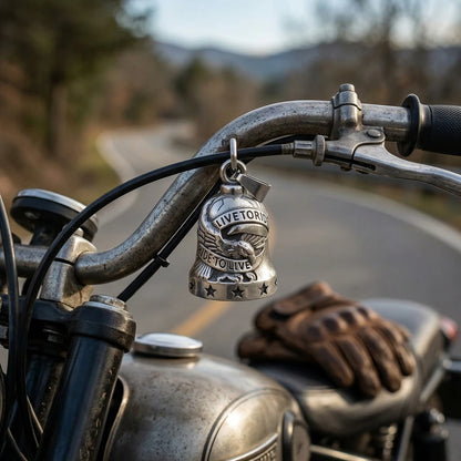 Live to Ride guardian bell gift for bikers shown in hand for scale
