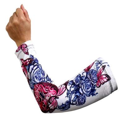 The Hot Leathers Lock Heart Arm Sleeve with a colorful tattoo design featuring roses and butterflies, made from sweat-wicking fabric with UPF 50 protection, worn on a raised arm with a clenched fist.