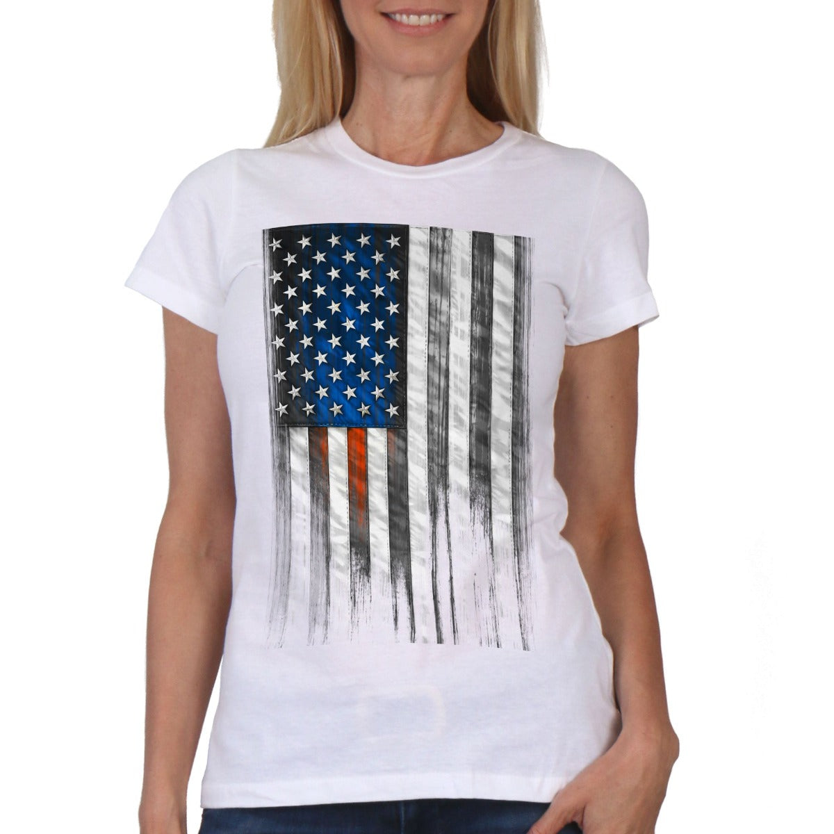 A person wearing the Hot Leathers Ladies Short Sleeve Heartbeat Flag T-Shirt, which is a white cotton tee with a screen-printed black and white American flag design featuring a single blue vertical stripe, stands against a plain background.