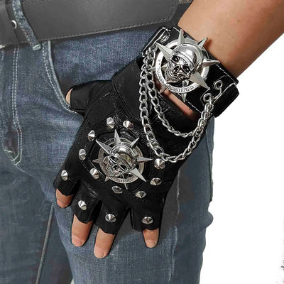 A man wearing a pair of Men's Skull Steampunk Biker Leather Gloves with chains and studs.