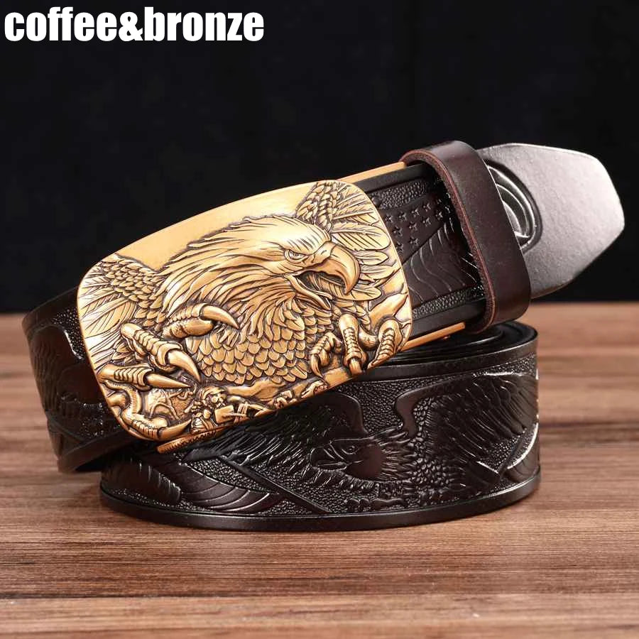 Alr™ Men's Leather Ratchet Belt, featuring a brown genuine leather strap with a detailed eagle design on a golden automatic buckle, is displayed on a wooden surface. The text "coffee&bronze" appears in the top left corner.