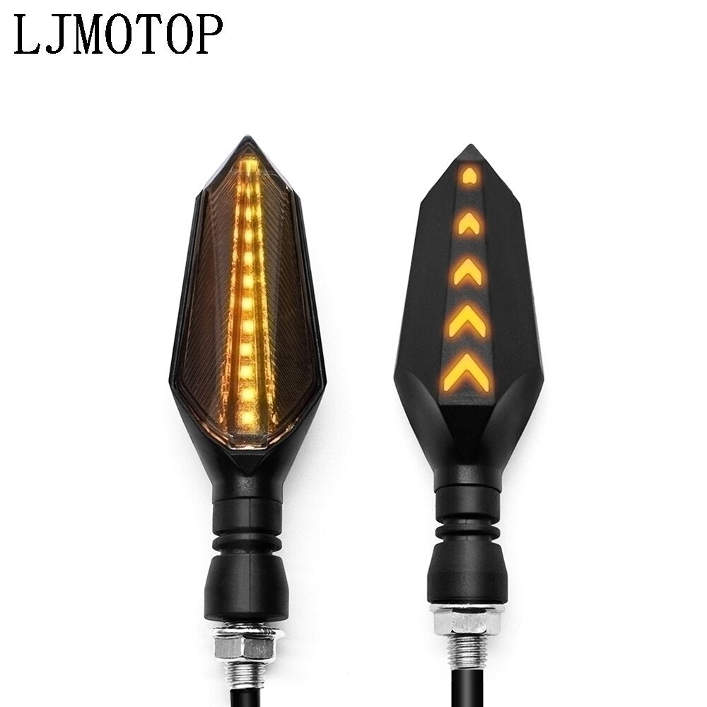 A pair of yellow Universal Motorcycle LED Turn Signal Sequential Flow lights, ensuring Sequential Flow and enhancing Safety on motorcycles.