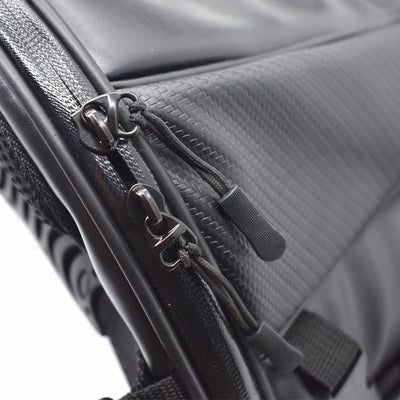 A waterproof close up of a black Waterproof Motorcycle Back Seat Tail Bag with zippers.