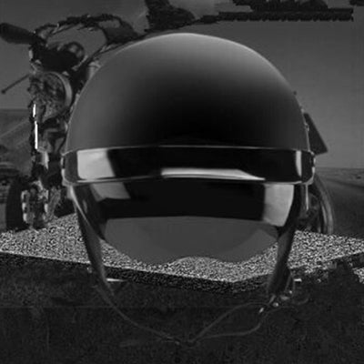 A D.O.T Certified Vintage Half Face Biker Helmet on a dirt road, ensuring safety and style.