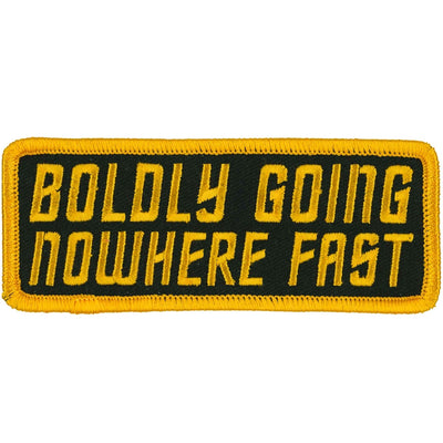 The Hot Leathers Boldly Going Nowhere 4" X 2" Patch is a rectangular, iron-on patch featuring yellow embroidery on a dark green background with the text "BOLDLY GOING NOWHERE FAST." It also has a yellow border.