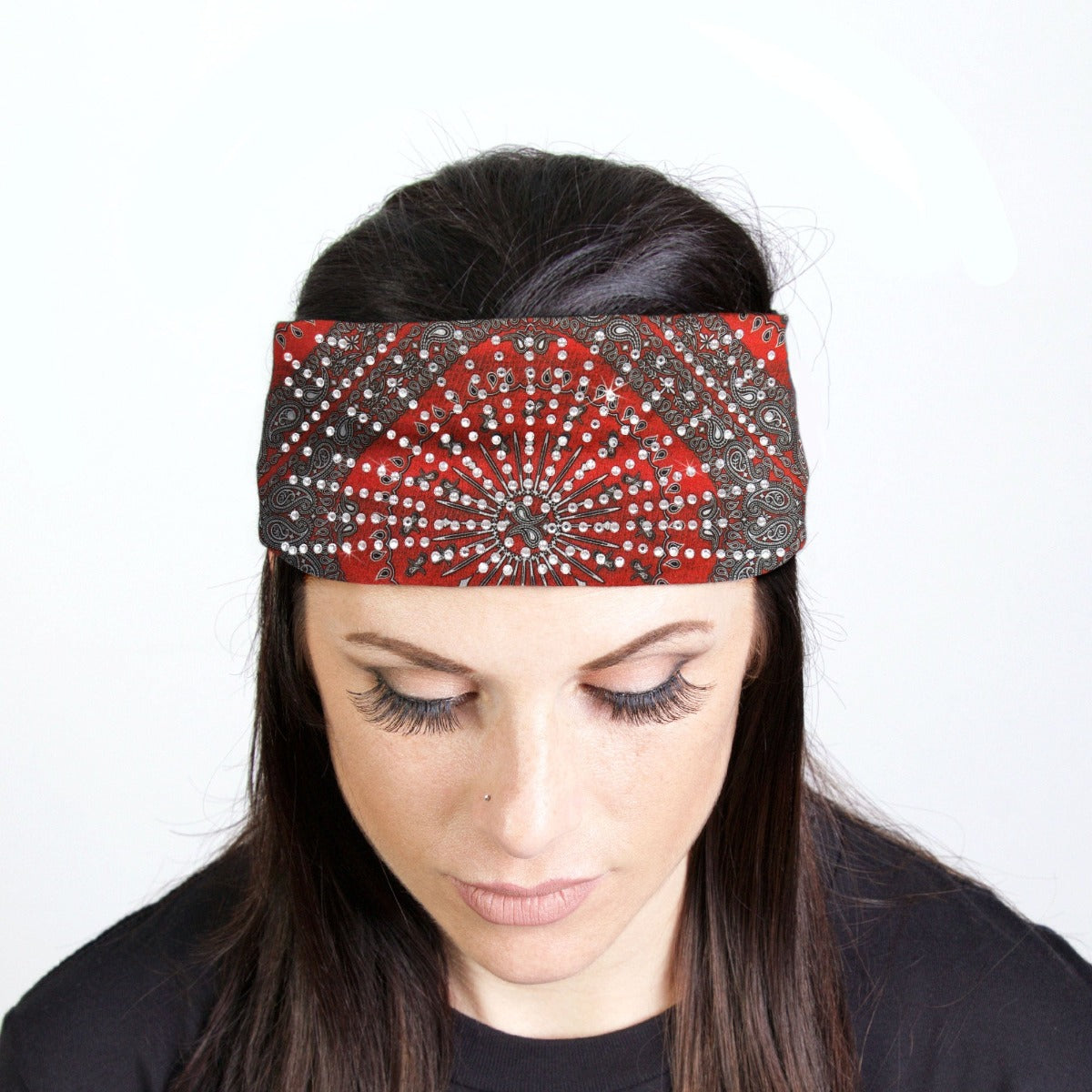 A woman with a biker style wearing a Hot Leathers Bandana Headband Wraps w/Rhinestones, Red.