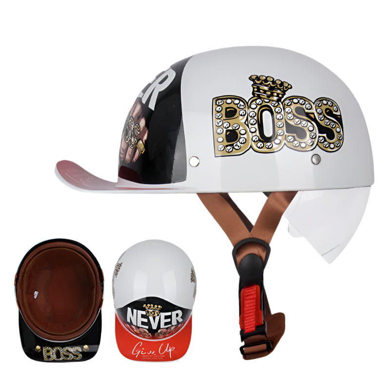 The ALR™ Baseball Cap Motorcycle Helmet features a white shell with "BOSS" and "NEVER Give Up" text, a gold crown graphic, vintage design, brown interior, and a black-red adjustable strap. Its lightweight comfort makes it ideal for any ride and is shown from multiple views.