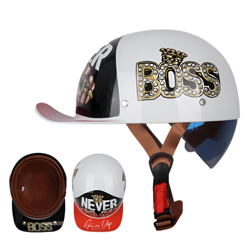 The ALR™ Baseball Cap Motorcycle Helmet is a white helmet featuring "BOSS" and "NEVER Give Up" in decorative letters, offering a vintage design with a visor, red strap, and blue inner lining for lightweight comfort.