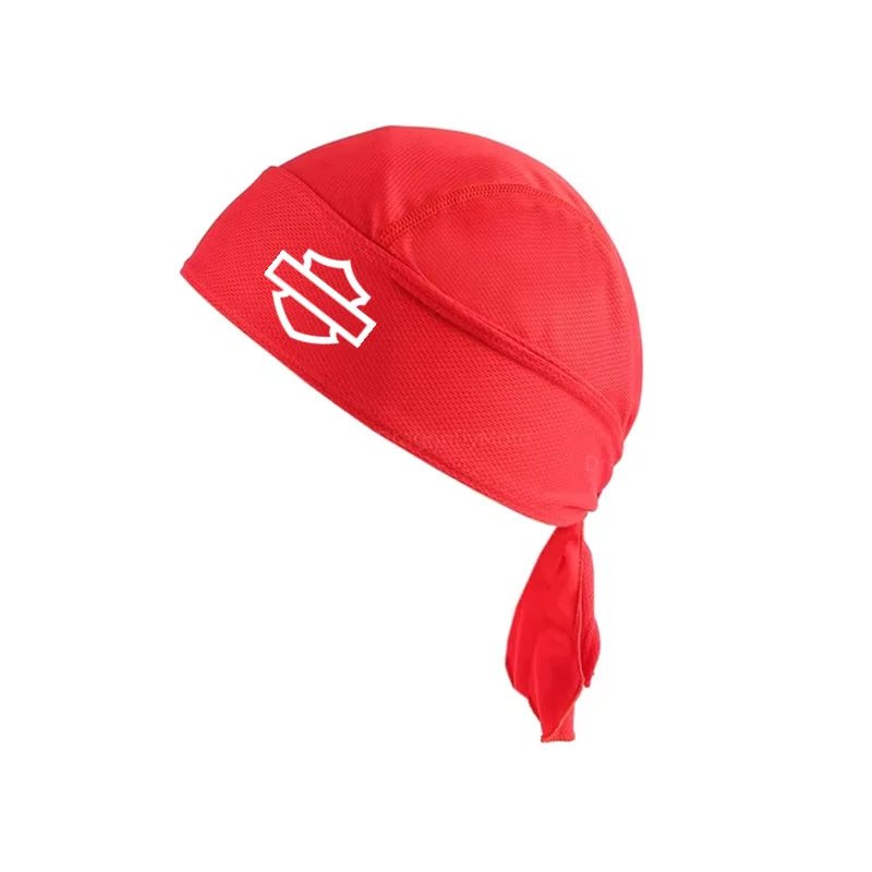 The ALR™ Summer Cycling Cap, in red breathable fabric, features a white shield logo and can be used as a versatile unisex helmet liner when tied at the back.