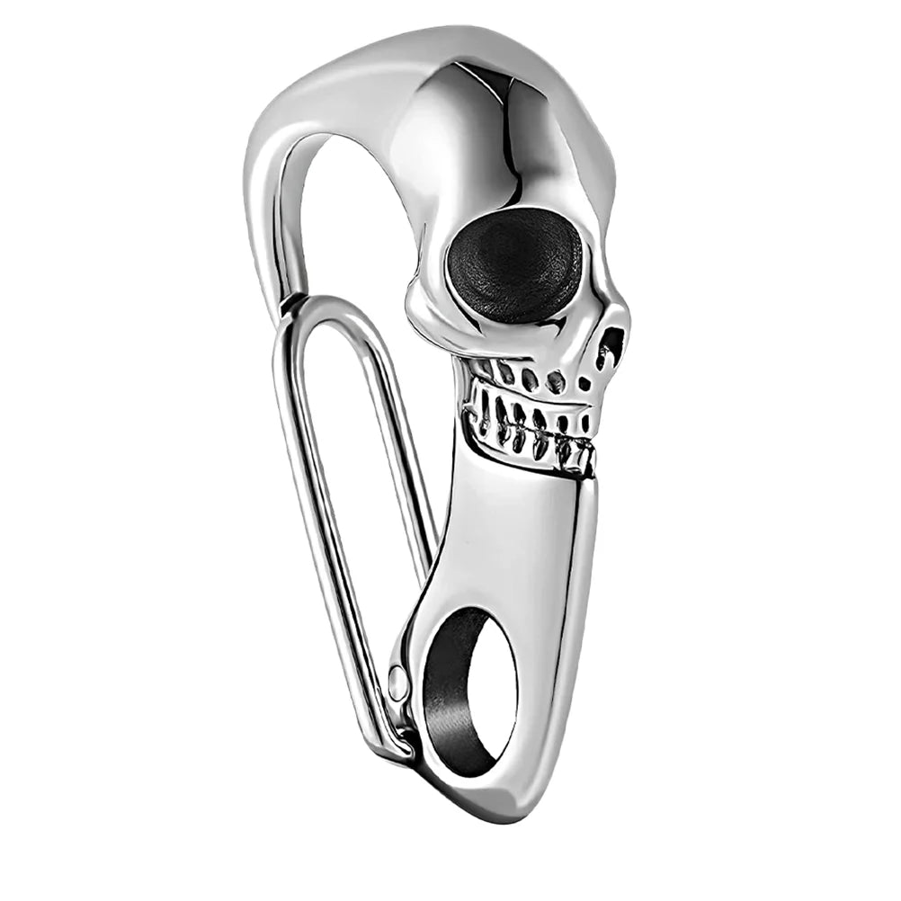 The ALR™ Skull Keychain Carabiner features a Gothic-inspired silver skull design crafted from stainless steel, equipped with a clip and loop for easy attachments.