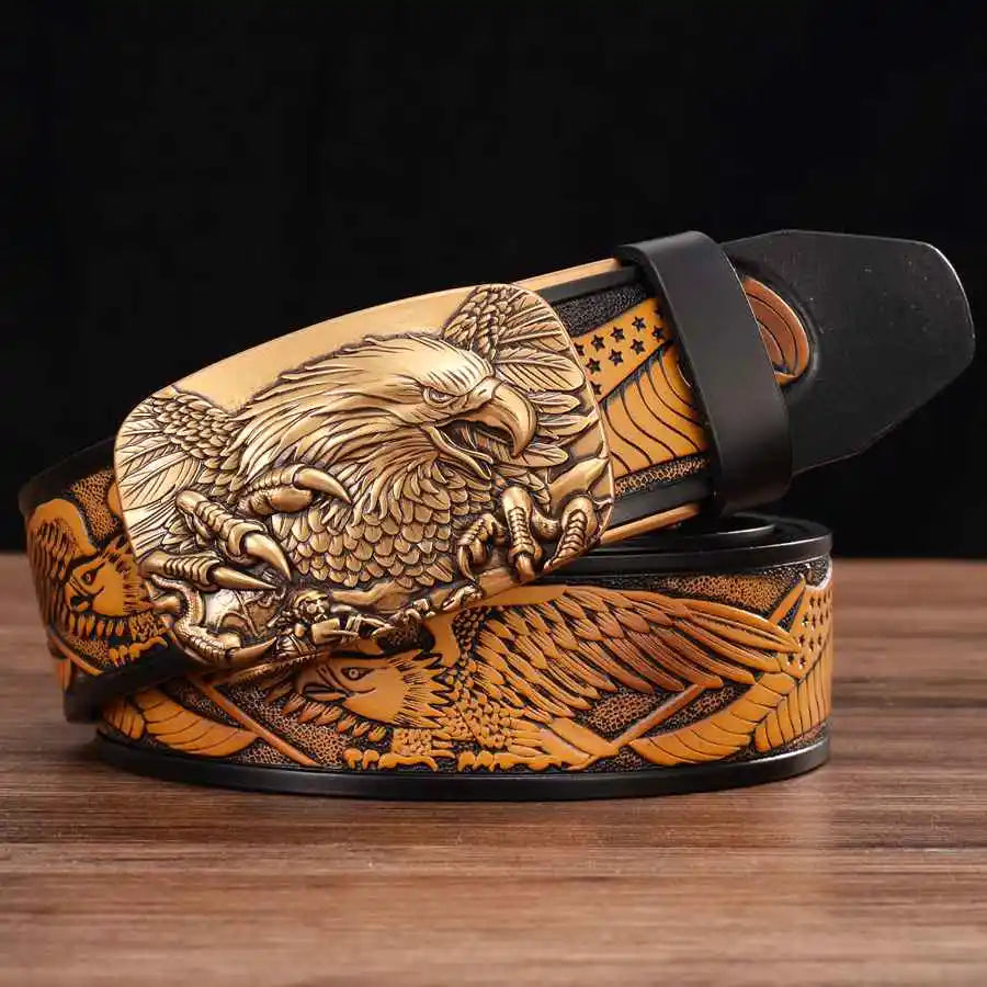 Alr™ Men's Leather Ratchet Belt showcasing an engraved eagle design and a detailed automatic buckle, beautifully presented on a wooden surface against a dark background.