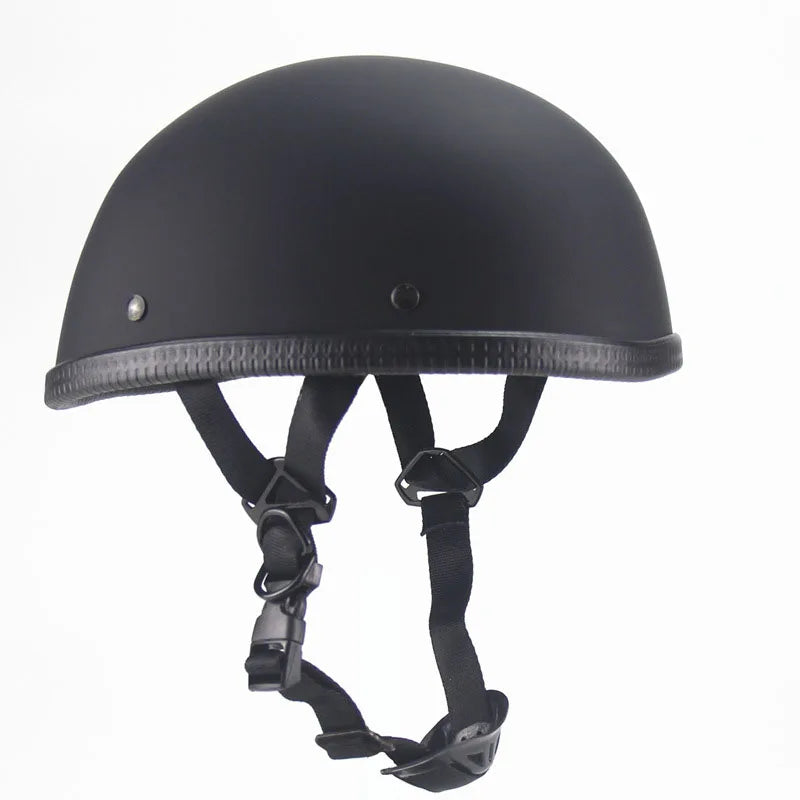 Introducing the Classic Half Helmet Harley Style: a black protective helmet featuring adjustable straps and a smooth finish, designed for safety purposes. This DOT-approved classic half helmet pairs perfectly with the Harley Heritage Classic, ensuring both style and unparalleled protection.