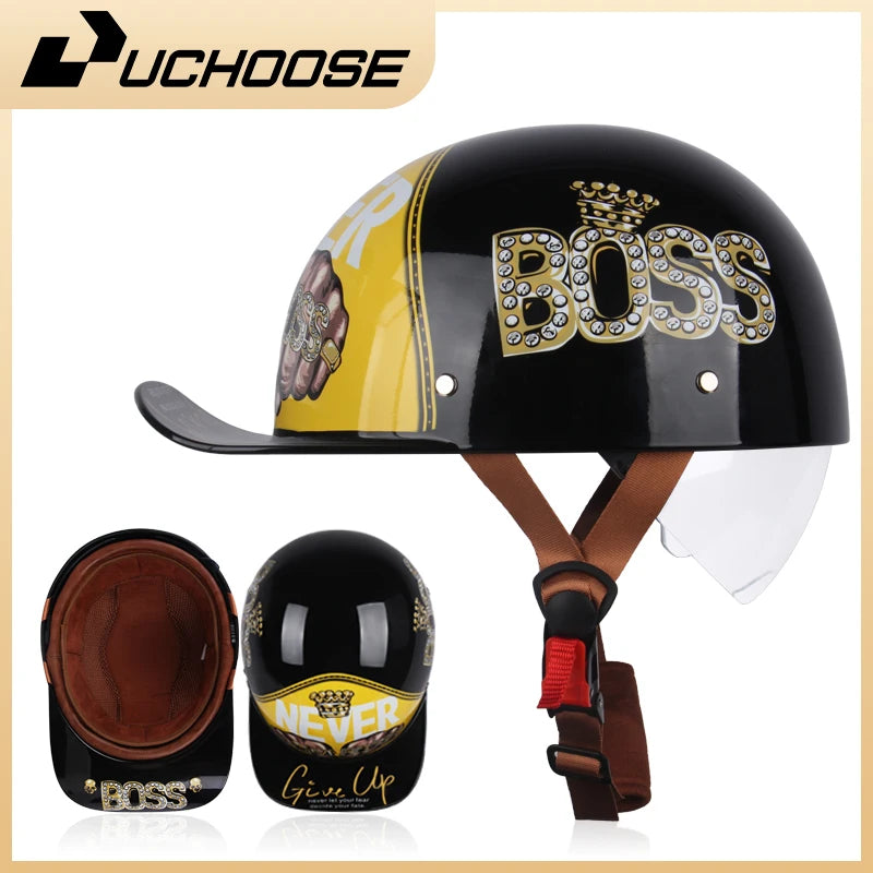 Experience lightweight comfort in the black and yellow helmet featuring a vintage design with "BOSS," "NEVER GIVE UP" prints, crown and chain motifs, and brown straps, reminiscent of an ALR™ Baseball Cap Motorcycle Helmet.