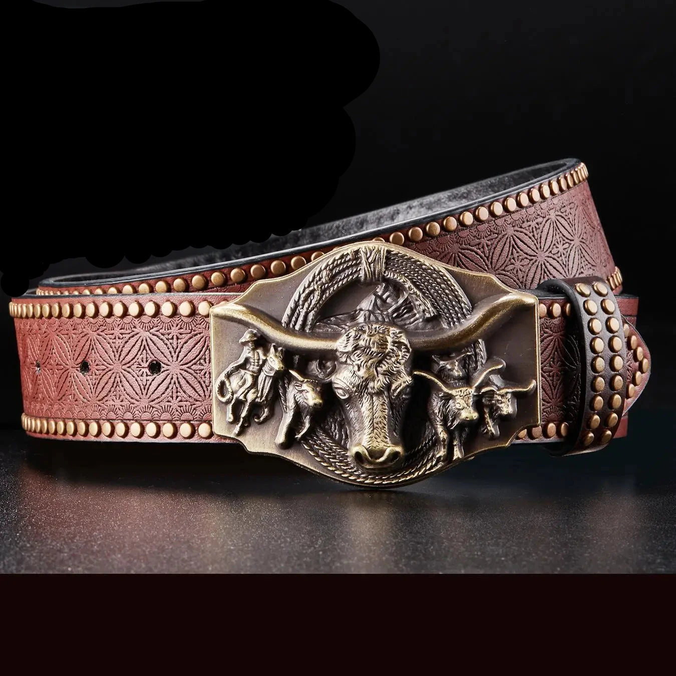 Introducing the Alr™ Vintage Western Cowboy Belt: This piece showcases exquisite handmade craftsmanship with its brown leather strap, beautifully embossed with an intricate geometric pattern. It is further enhanced by a large metal buckle adorned with an impressive longhorn bull design.