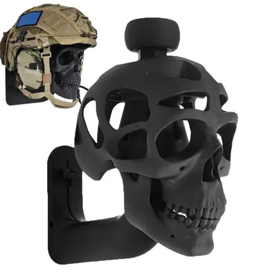 The Alr™ 3D Skull Motorcycle Helmet Display Rack in black offers a captivating way to hold a tan tactical helmet securely on top, making it an ideal wall-mounted decor piece.