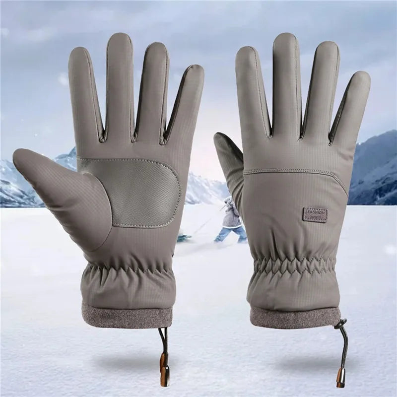 The ALR™ Winter Cold-proof Gloves are premium-quality gray gloves made from durable polyester, featuring reinforced palms and adjustable wrist straps, showcased against a snowy mountain backdrop.