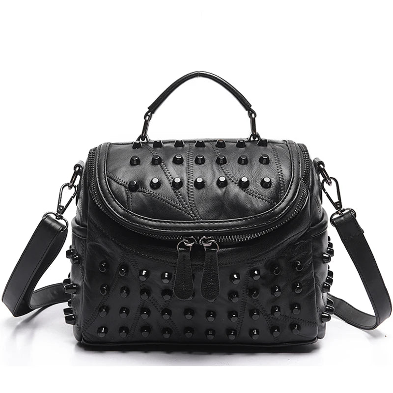 The ALR™ Luxury Women’s Genuine Leather Bag is a designer-level black handbag made from premium sheepskin. It features a studded design, detachable straps, and dual zipper closures for versatile elegance.