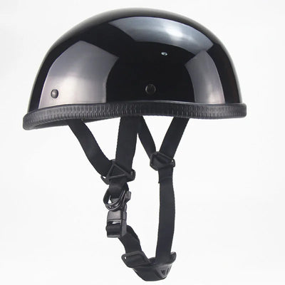 The Classic Half Helmet Harley Style, featuring a sleek black glossy finish and adjustable chin straps, embodies a timeless half helmet design against a white background. DOT-approved for your safety.